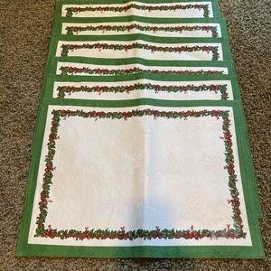 6-Holiday placemats 18”x 14” White with green trim and holly wrapped around